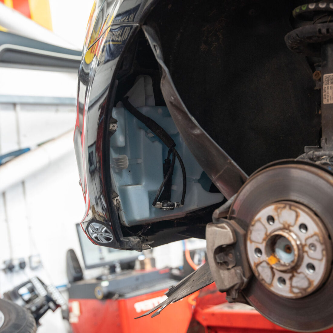 close up of left car brake on wheel